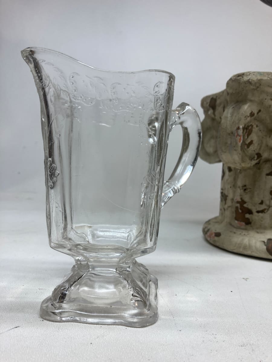 EAPG clear glass full pitcher 