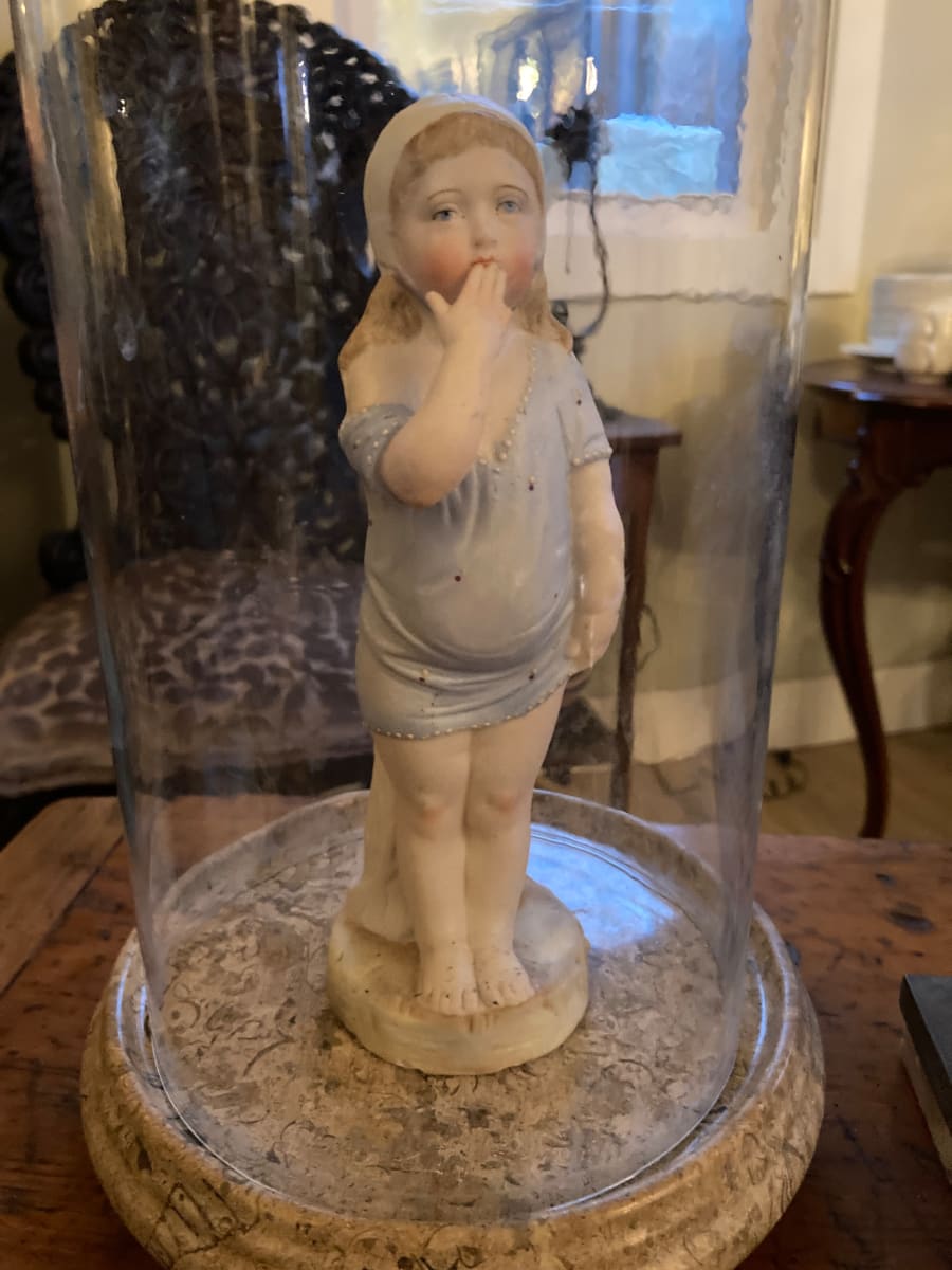 Small bisque figure of child in blue night shirt 