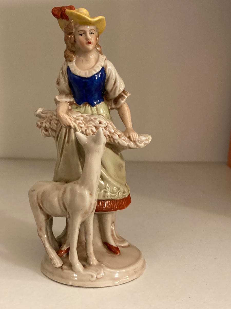 Porcelain figure of girl and deer 