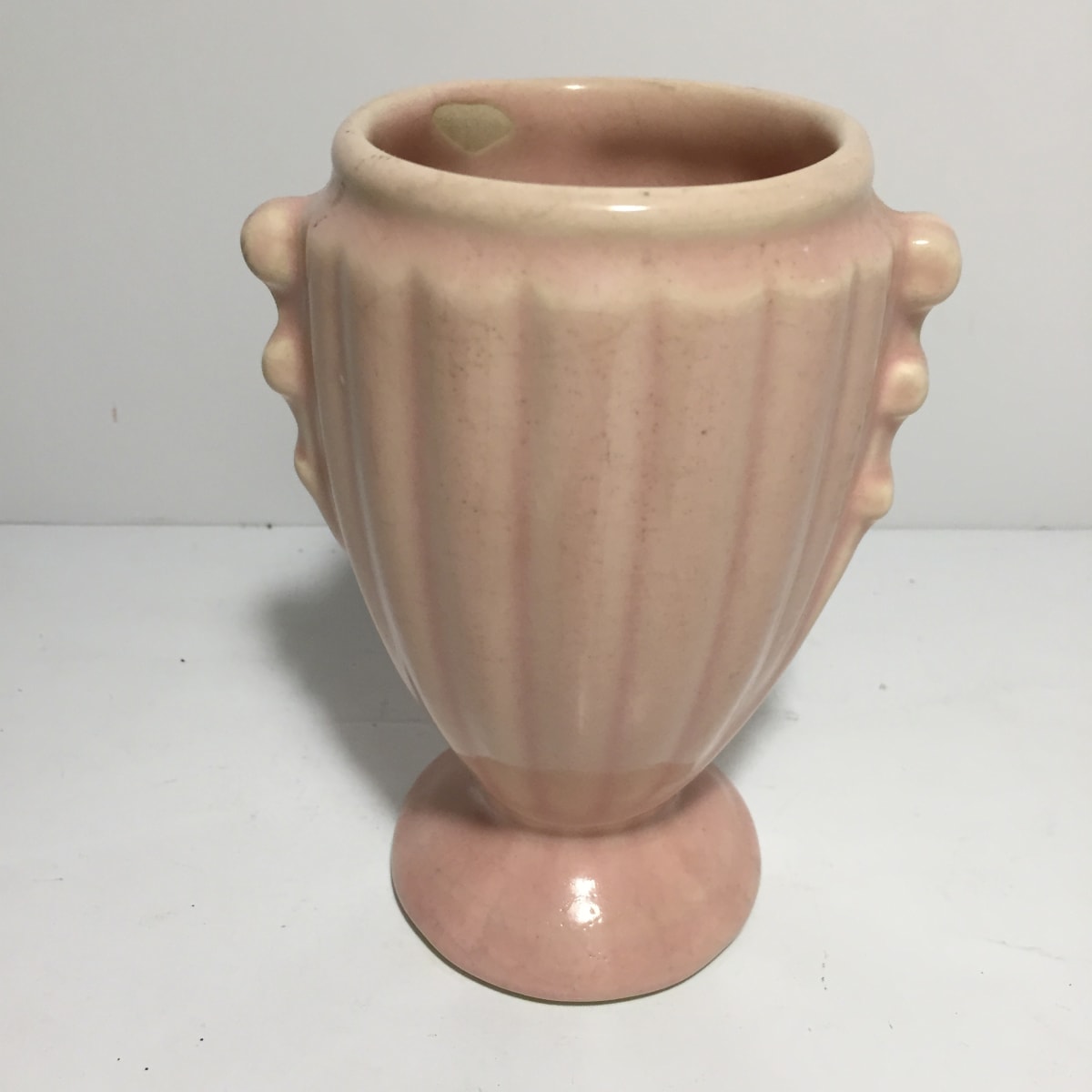 small pink art pottery vase, Image 1.