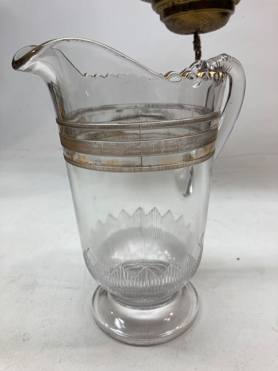 EAPG clear glass pitcher with gold accent collar 