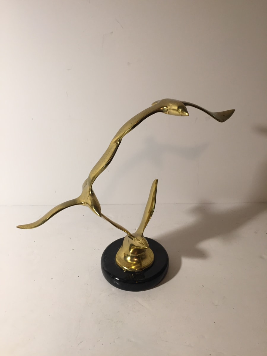 brass modern bird sculpture 