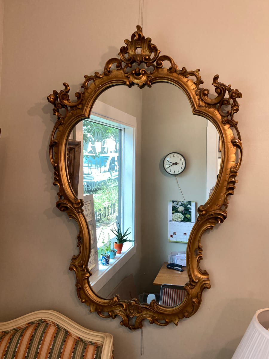 Carved ornate gold mirror 