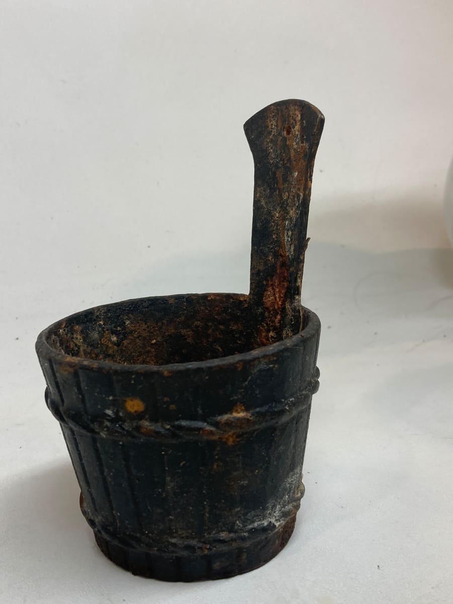 Iron wall bucket holder 