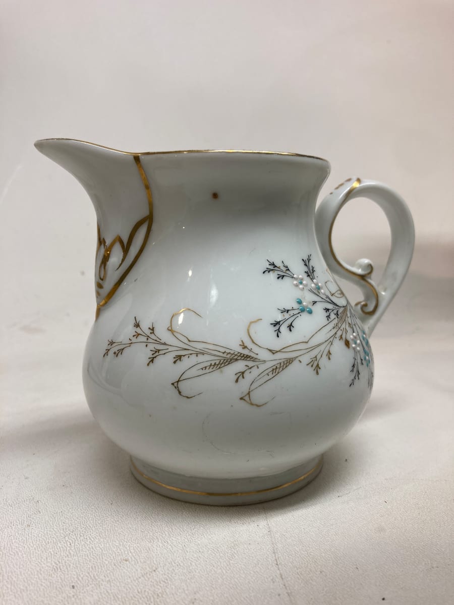 small porcelain pitcher 