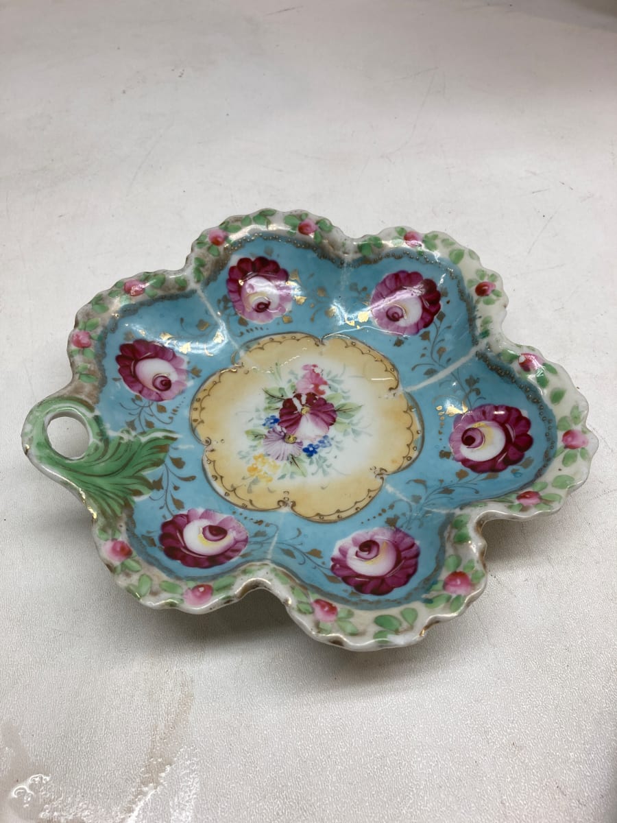 hand decorated blue low dish 