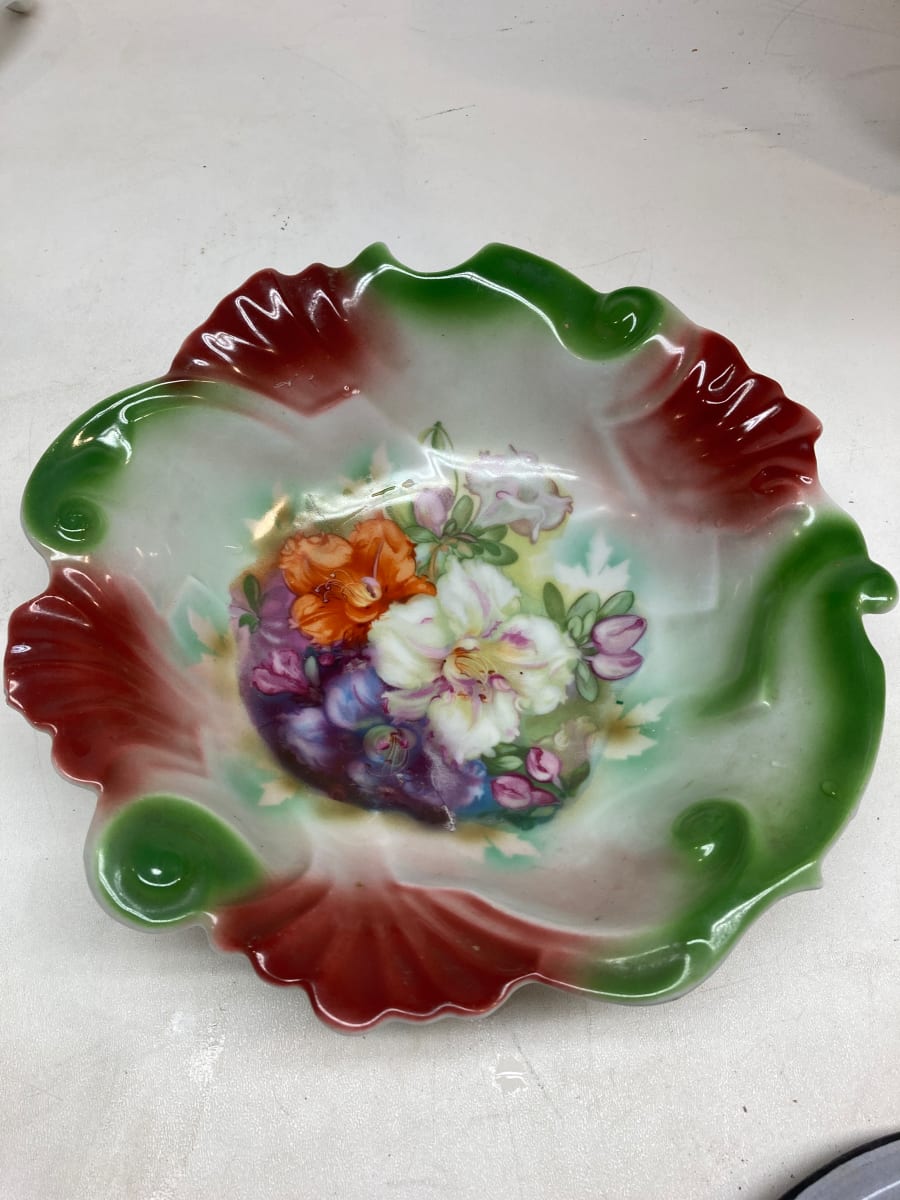 Hand decorated serving bowl with red and green accents 