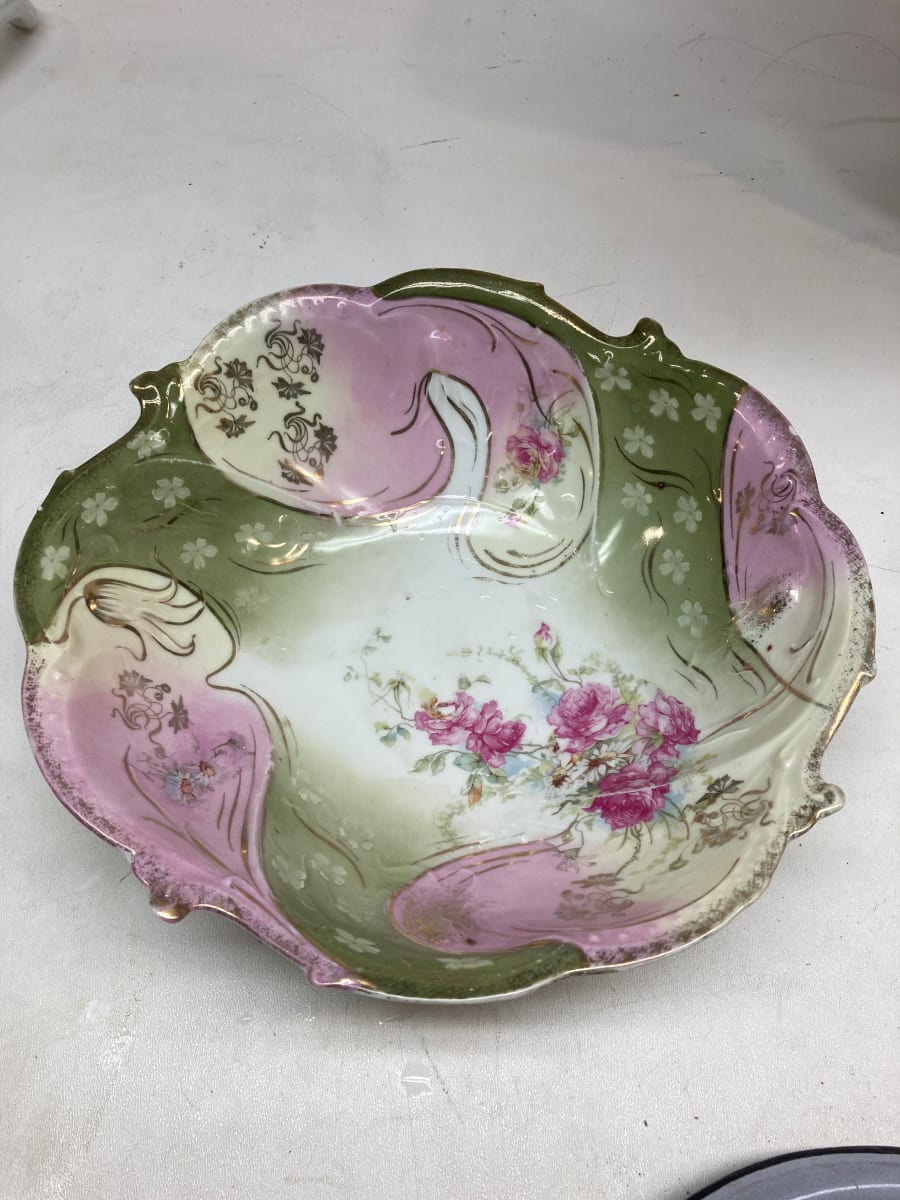 Hand decorated serving bowl with pink and green accents 