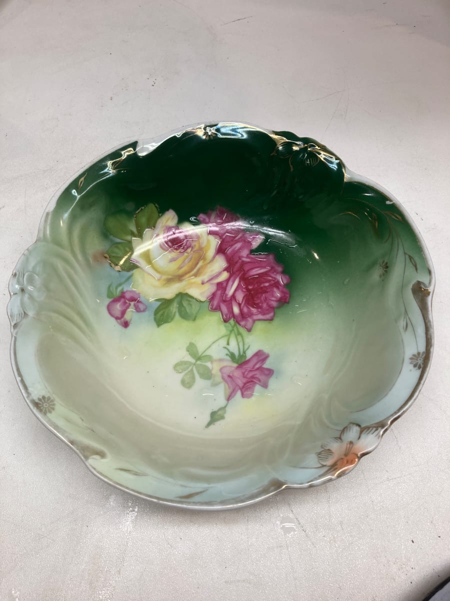 Hand decorated serving plate with green background and rose decoration 