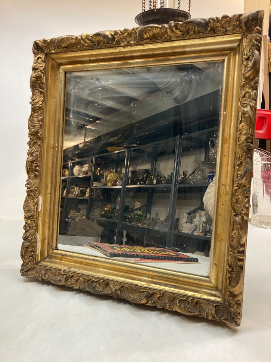 Framed ornate gold mirror 