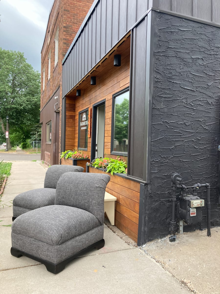 Pair of white soft contemporary chairs with black asian base 