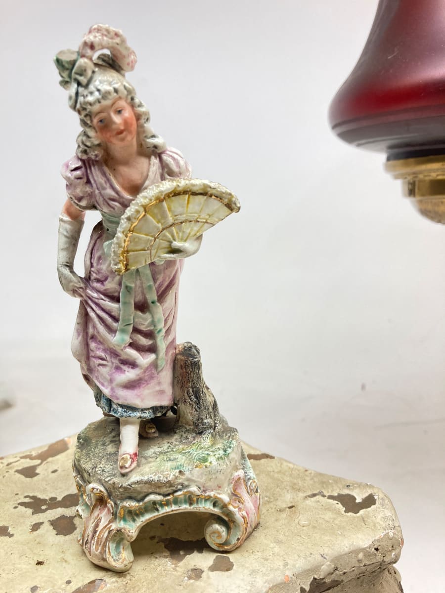 Hand painted porcelain woman figure with fan 