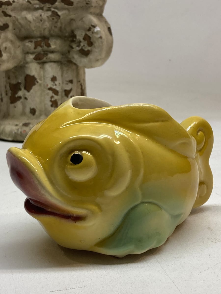 yellow pottery fish planter 