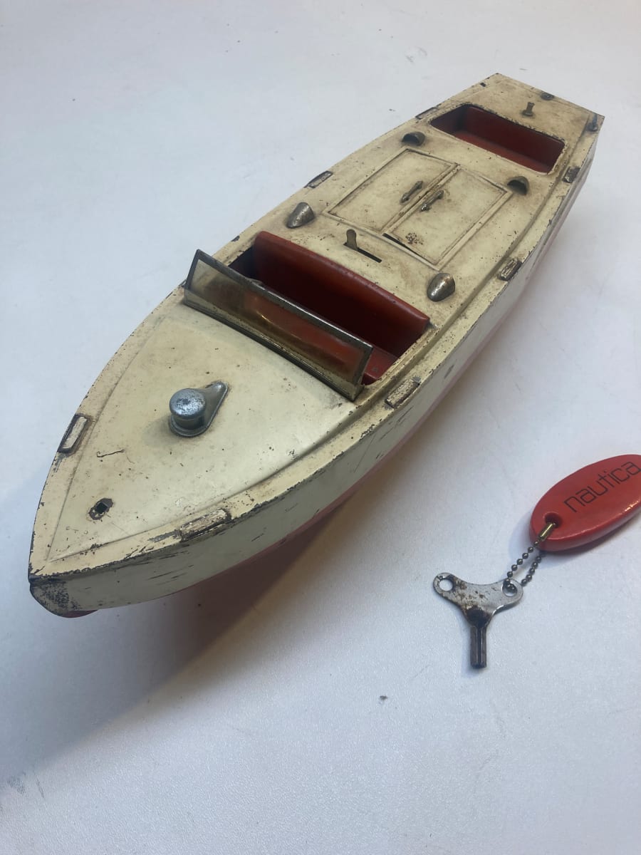 Lionel craft tin wind up toy boat from the collection of TIMELINES