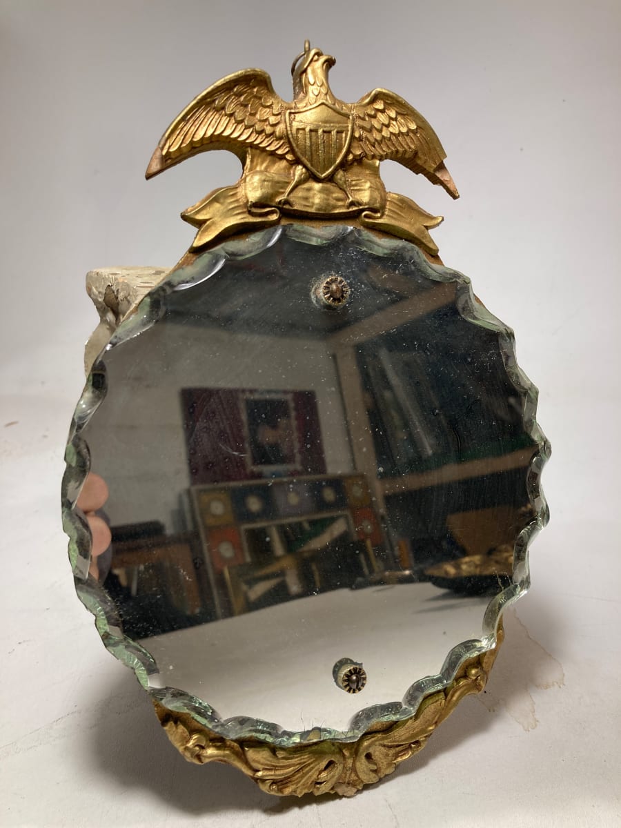 Small decorative mirror with eagle 