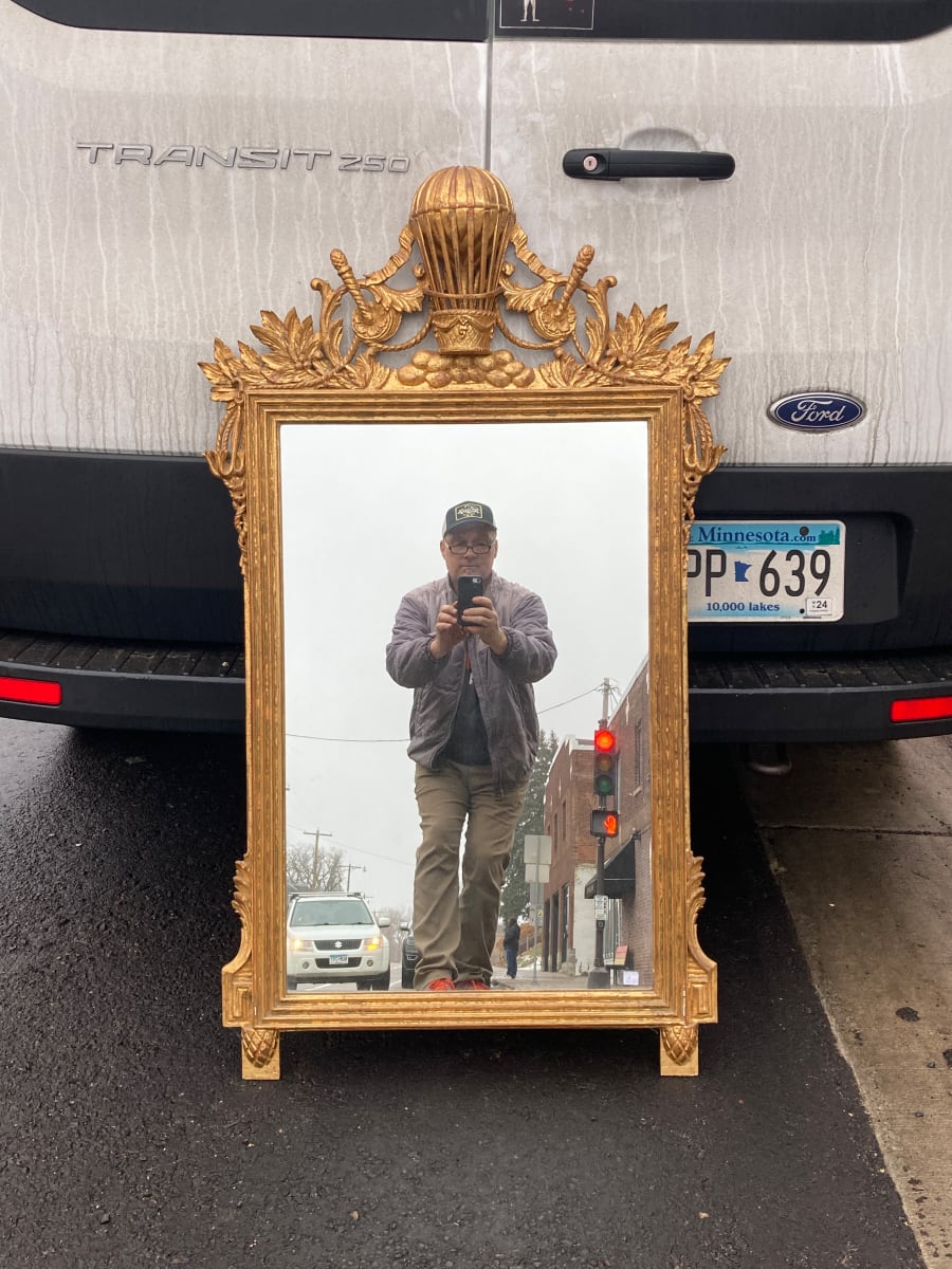 Carved gold gilt mirror with ornate frame with balloon 