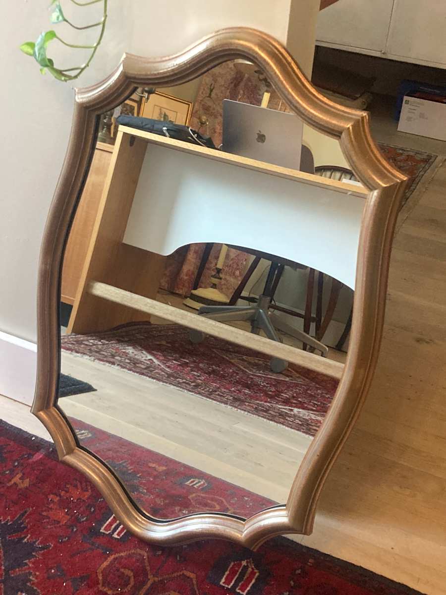 Framed shapely mirror 