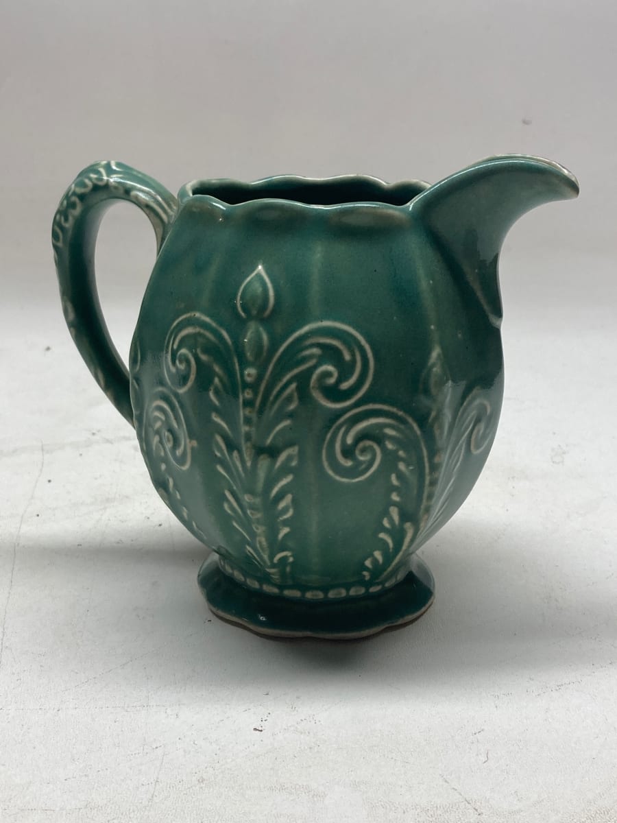 decorated pottery blue green pitcher 