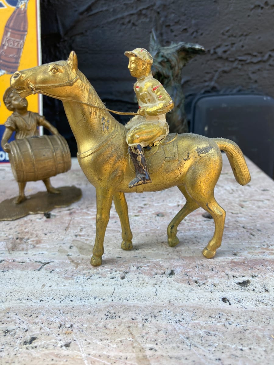 metal horse and rider figure 