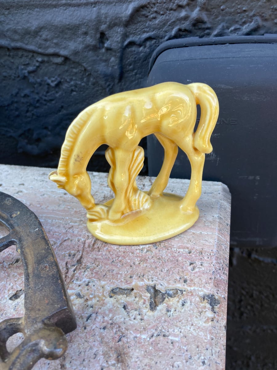 Yellow pottery horse 