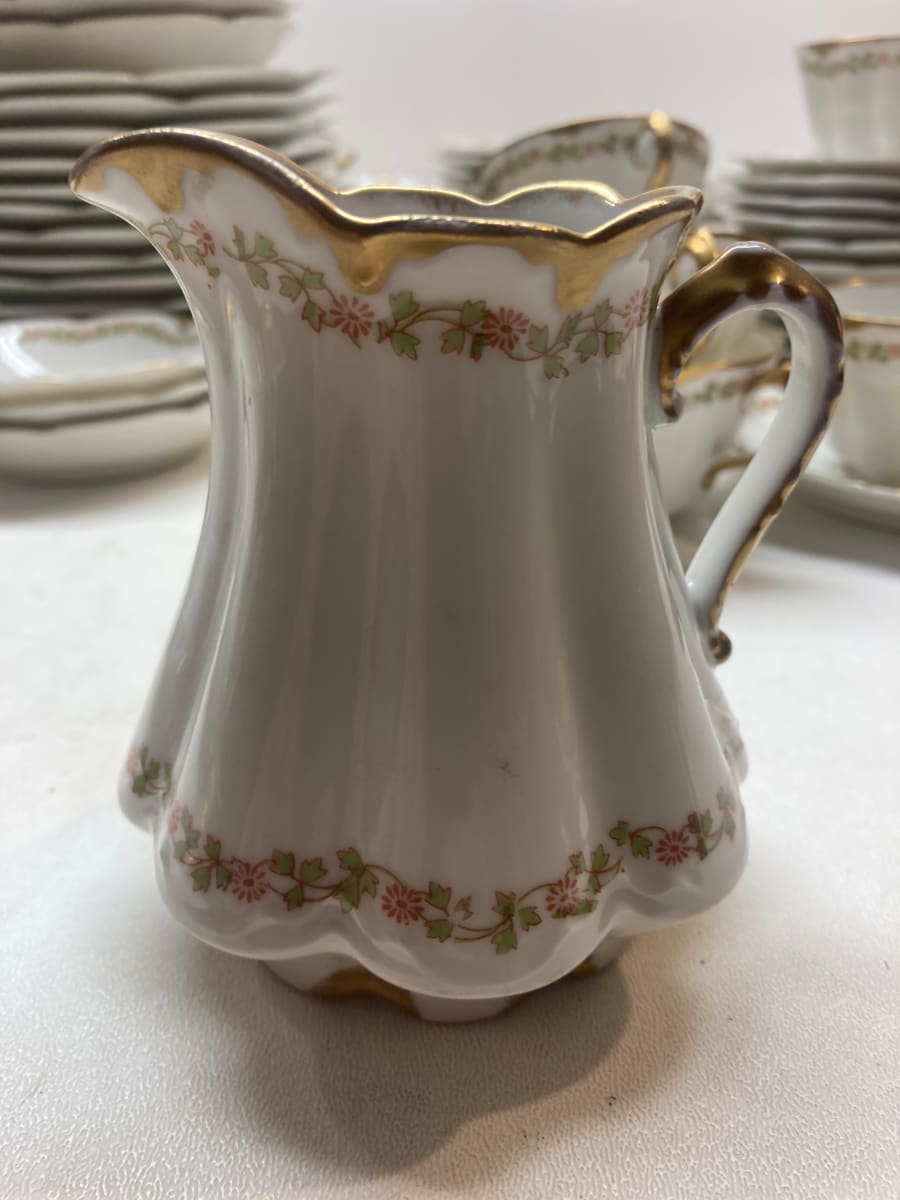 Haviland Limoges French porcelain creamer with red flowers and green leaves 