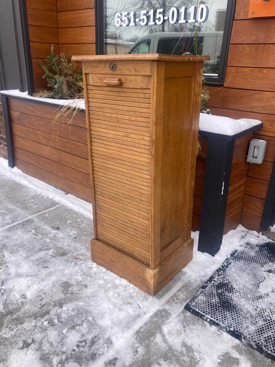 Narrow oak sheet music cabinet 