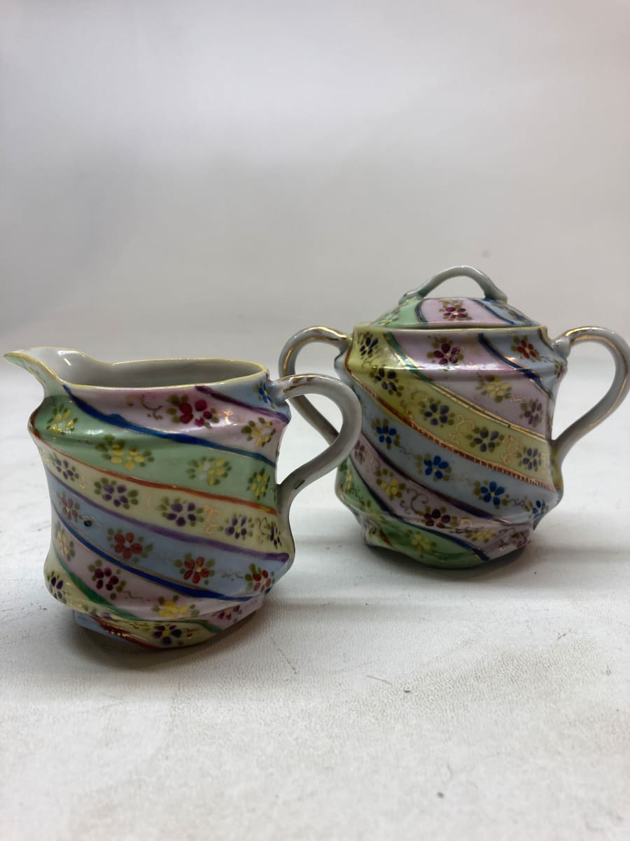 porcelain decorated creamer and sugar 