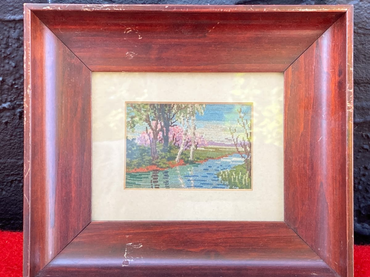 framed petit point embroidered scene 