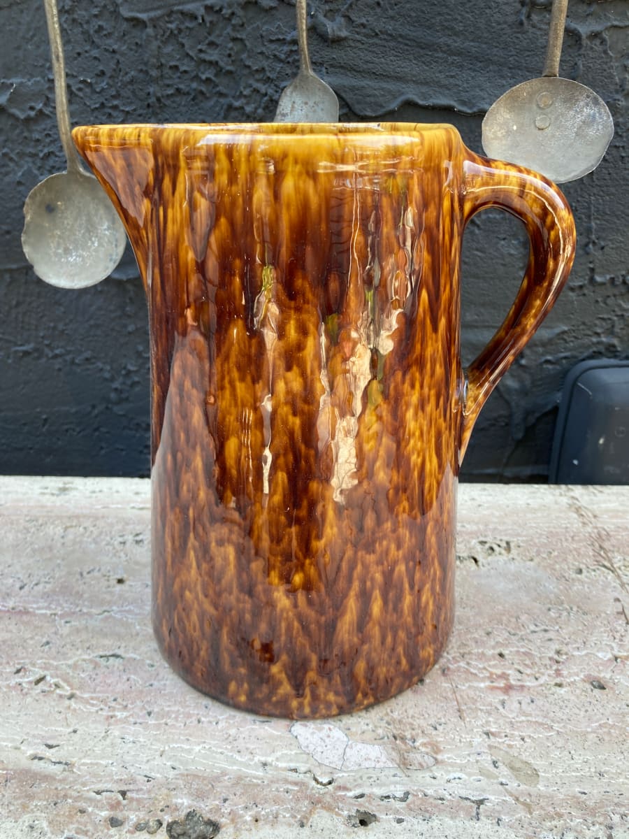 Tall Bennington pottery pitcher 