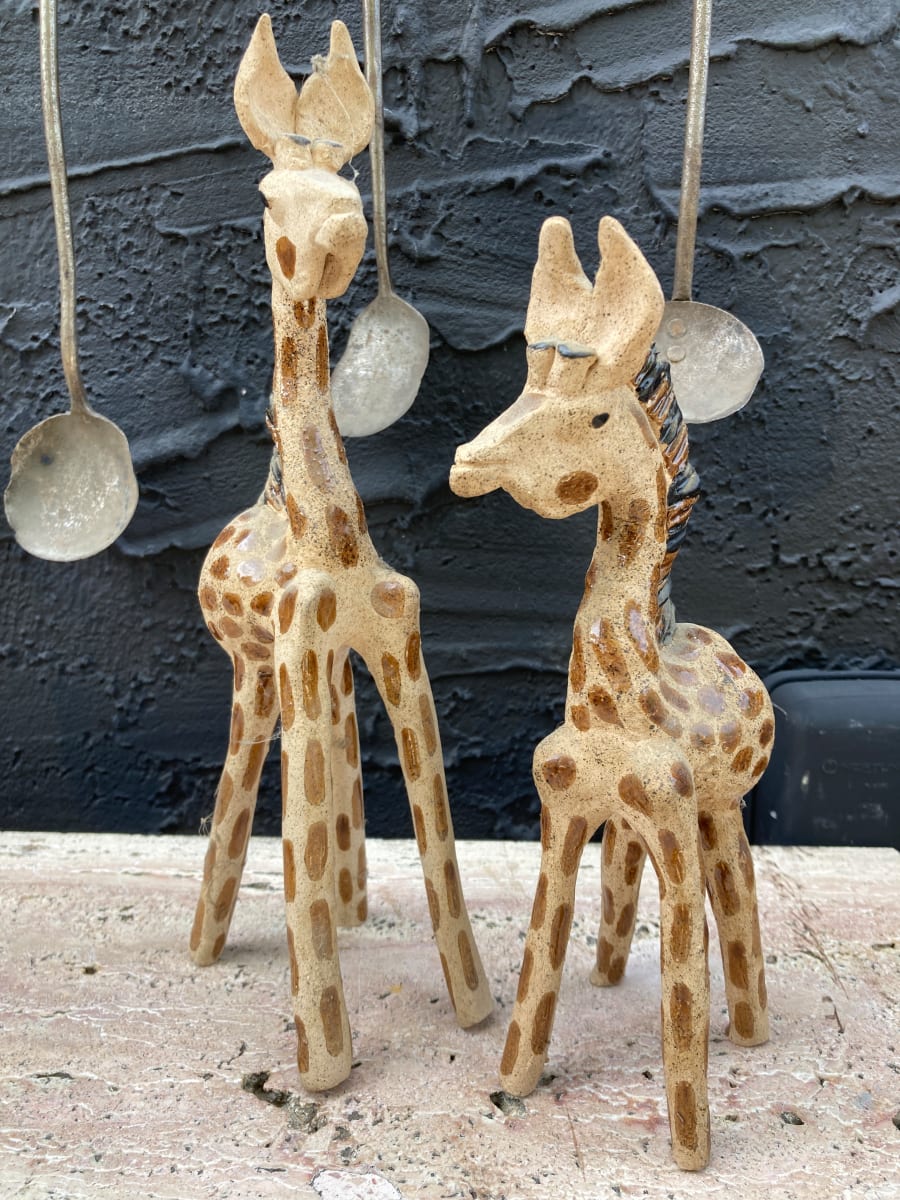 Hand made pottery giraffes 
