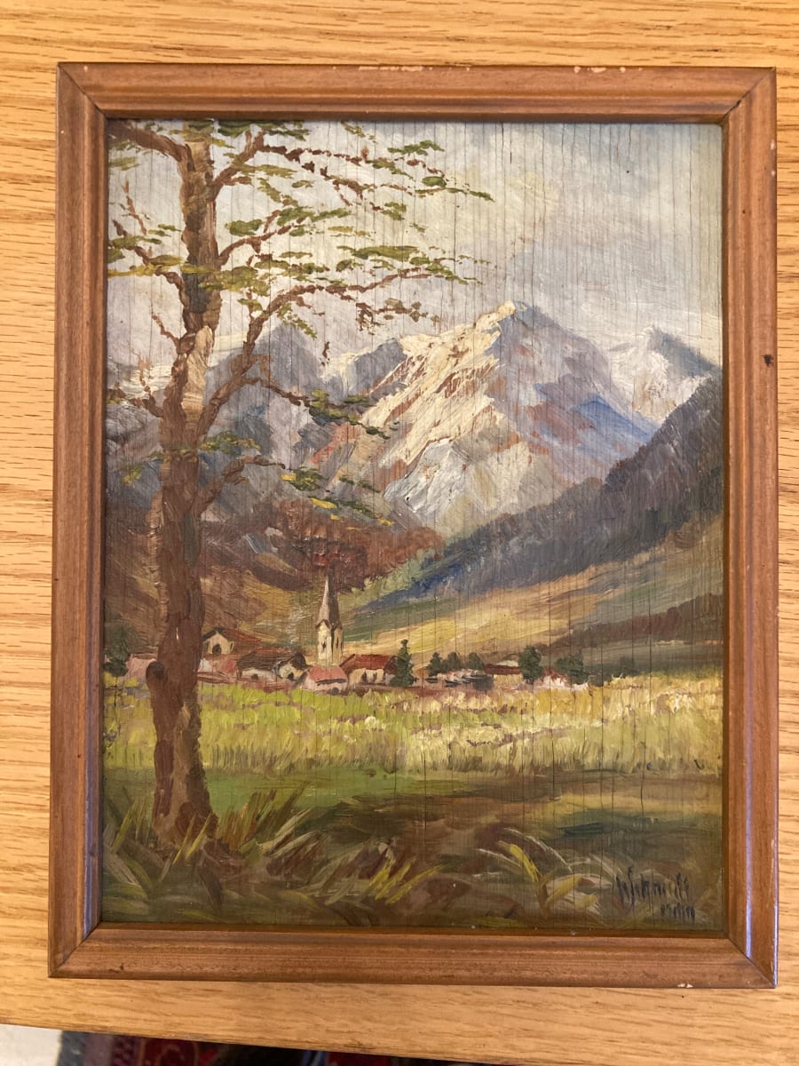 Framed mountain scene on board 