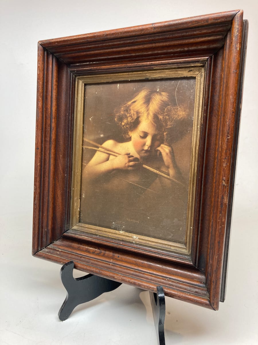 Framed photo of cupid 