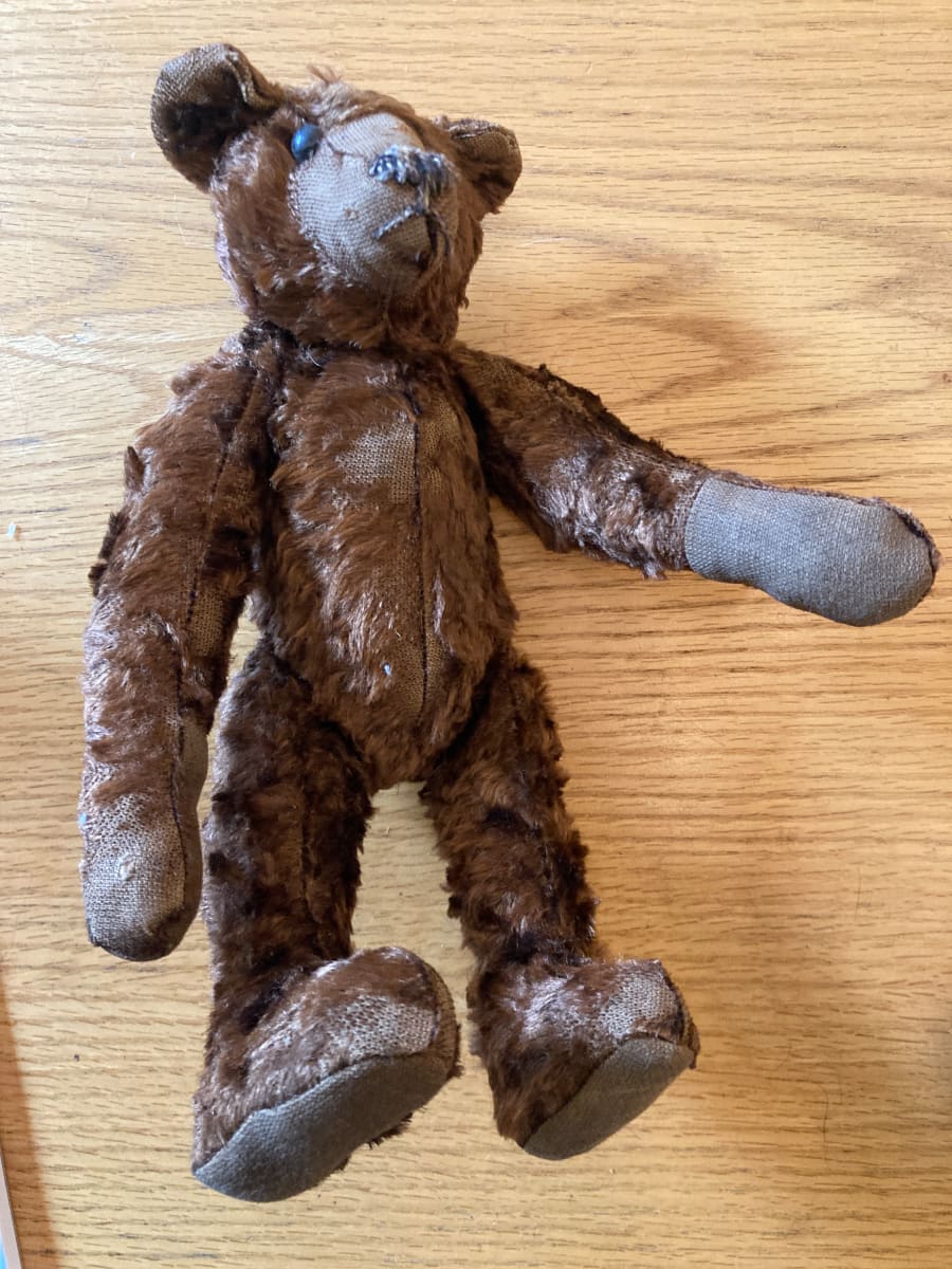 Vintage brown teddy bear with long arms 