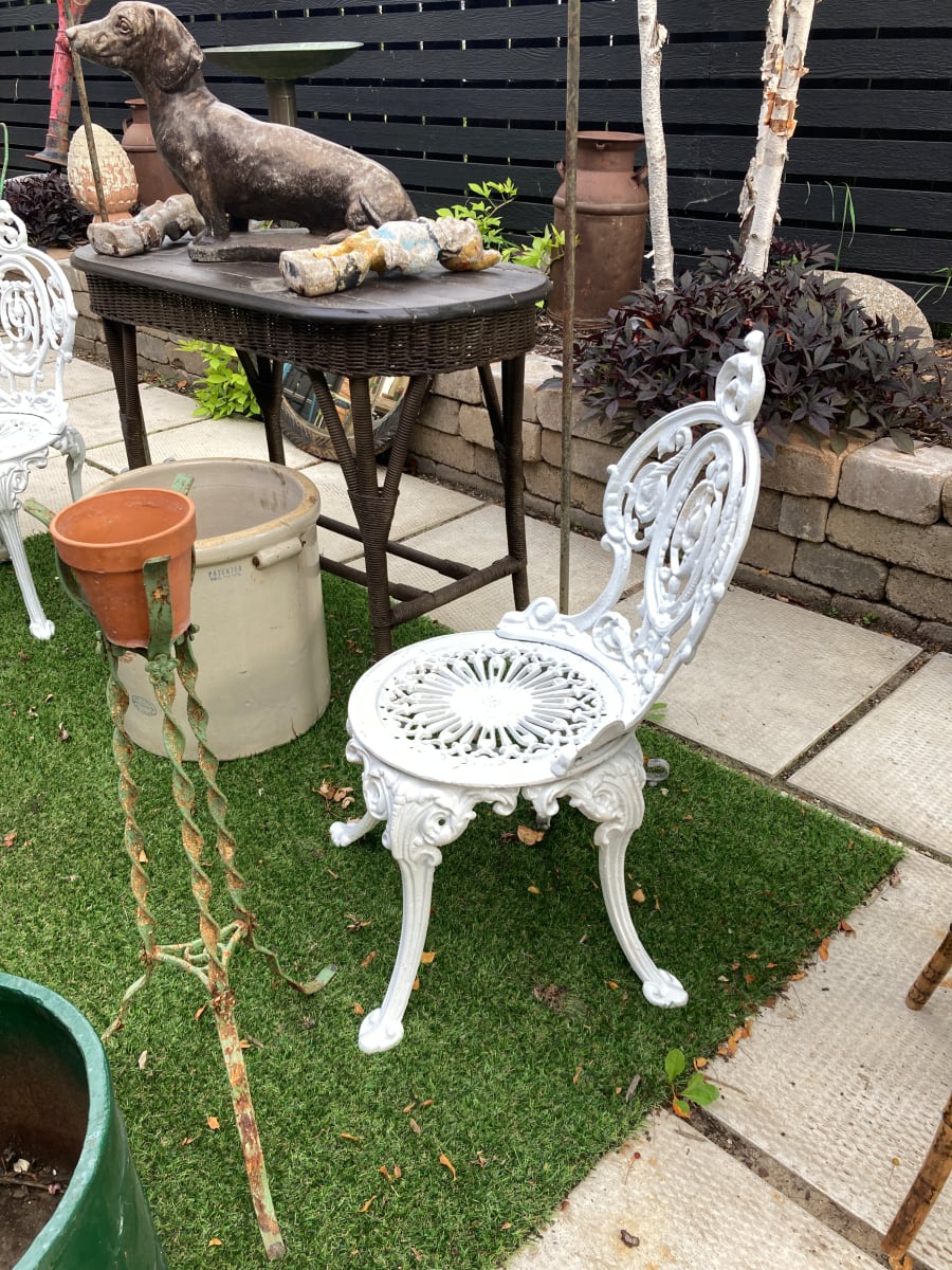 Pair of cast iron garden chairs 