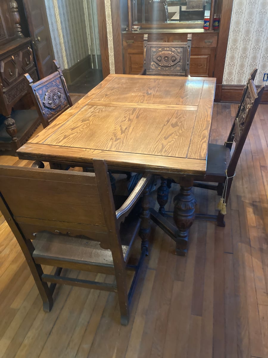 Carved oak dining room table 