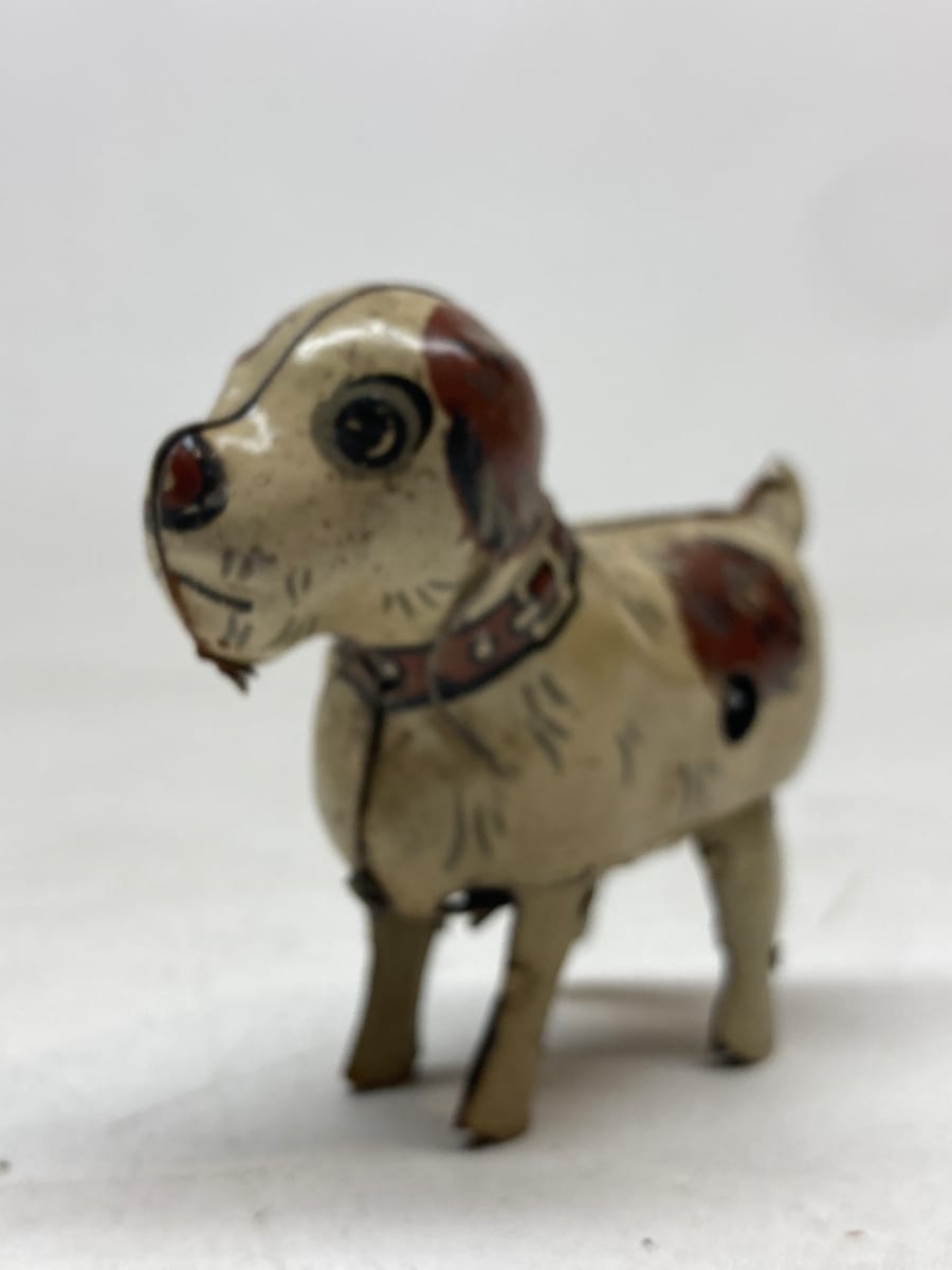 Japanese tin wind up dog toy 