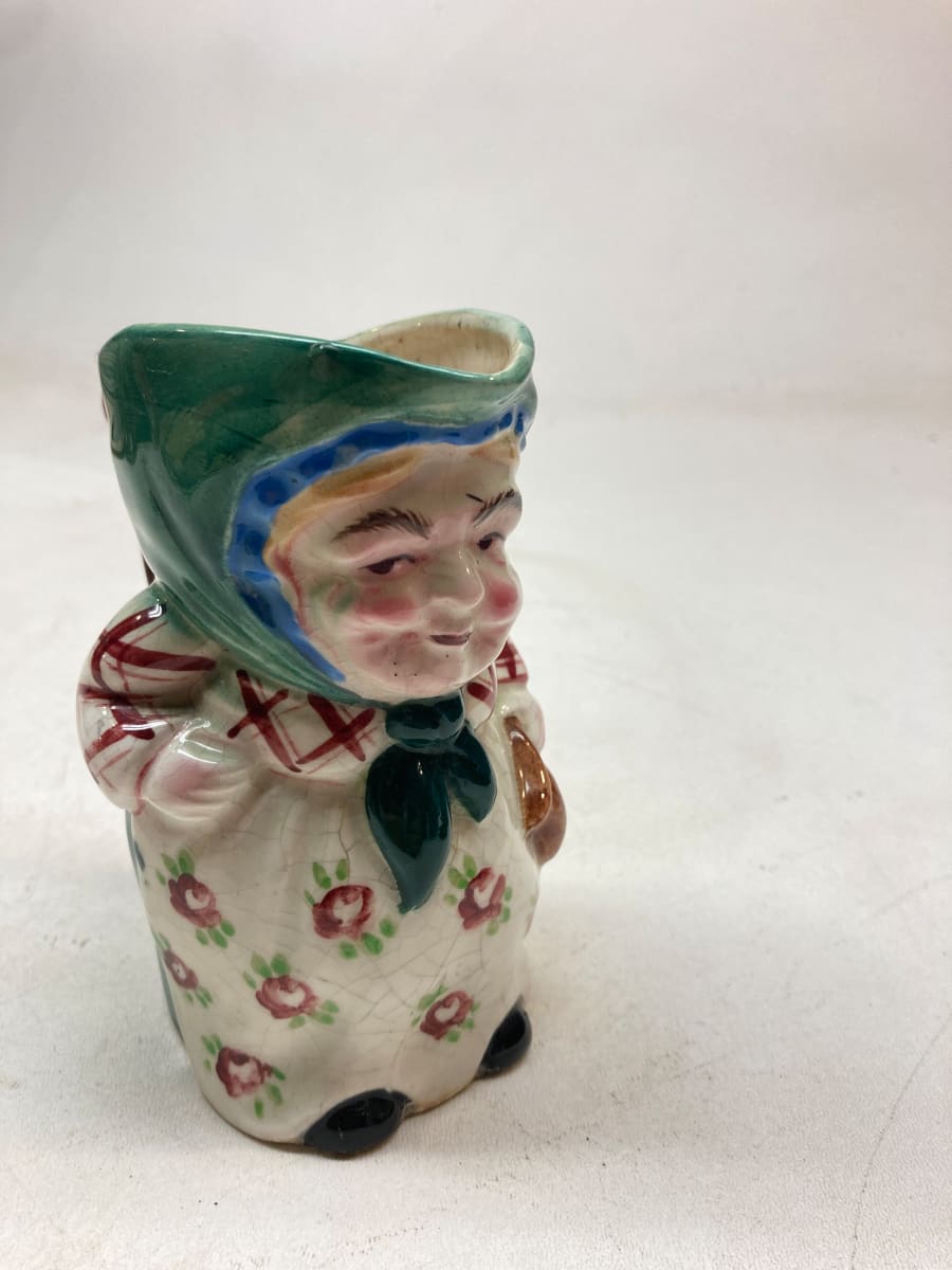 Figural pottery pitcher 