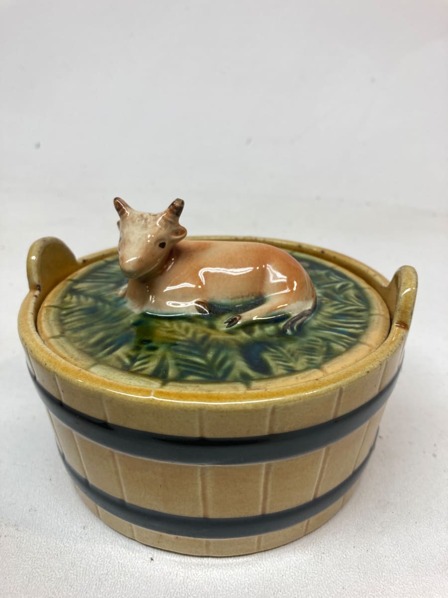 Majolica cow covered butter dish 