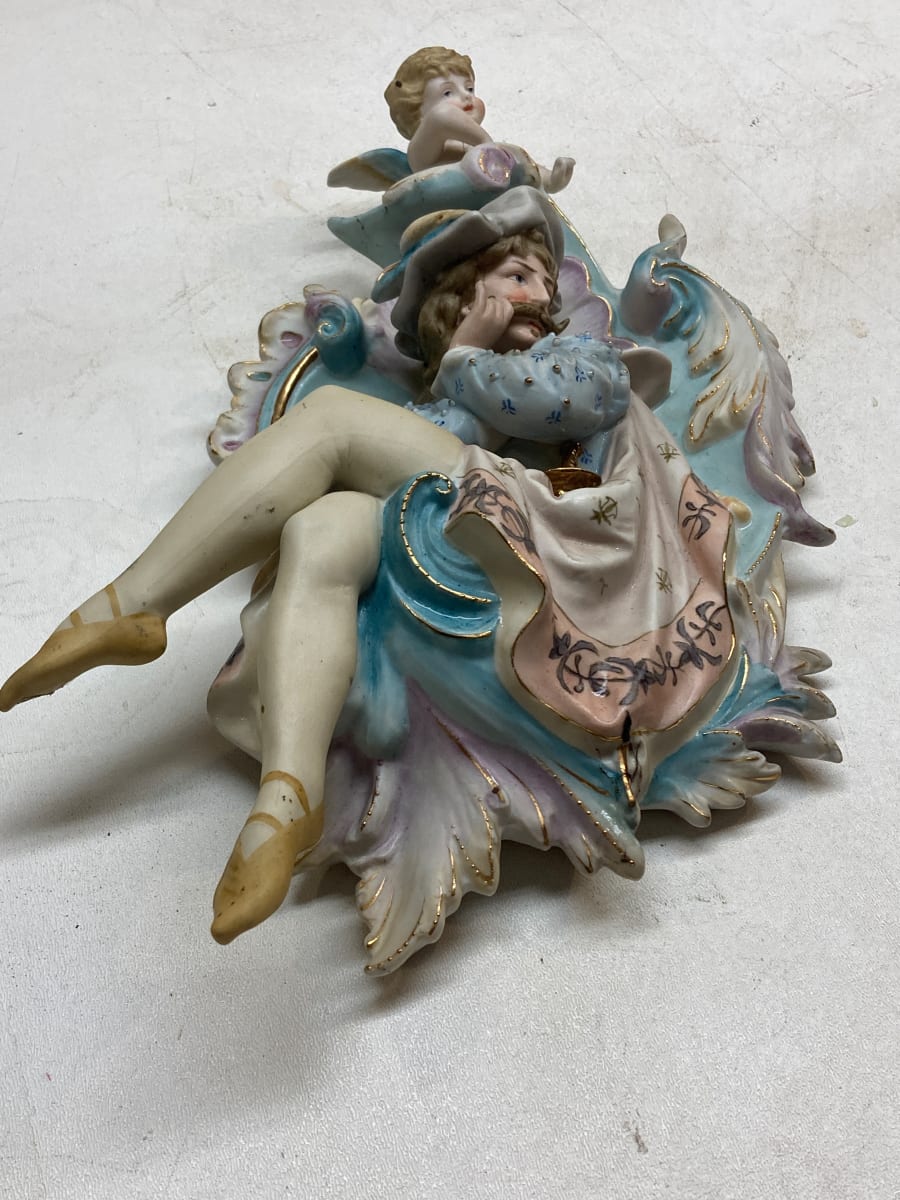 hand painted ornate porcelain figural plaque with cherub 
