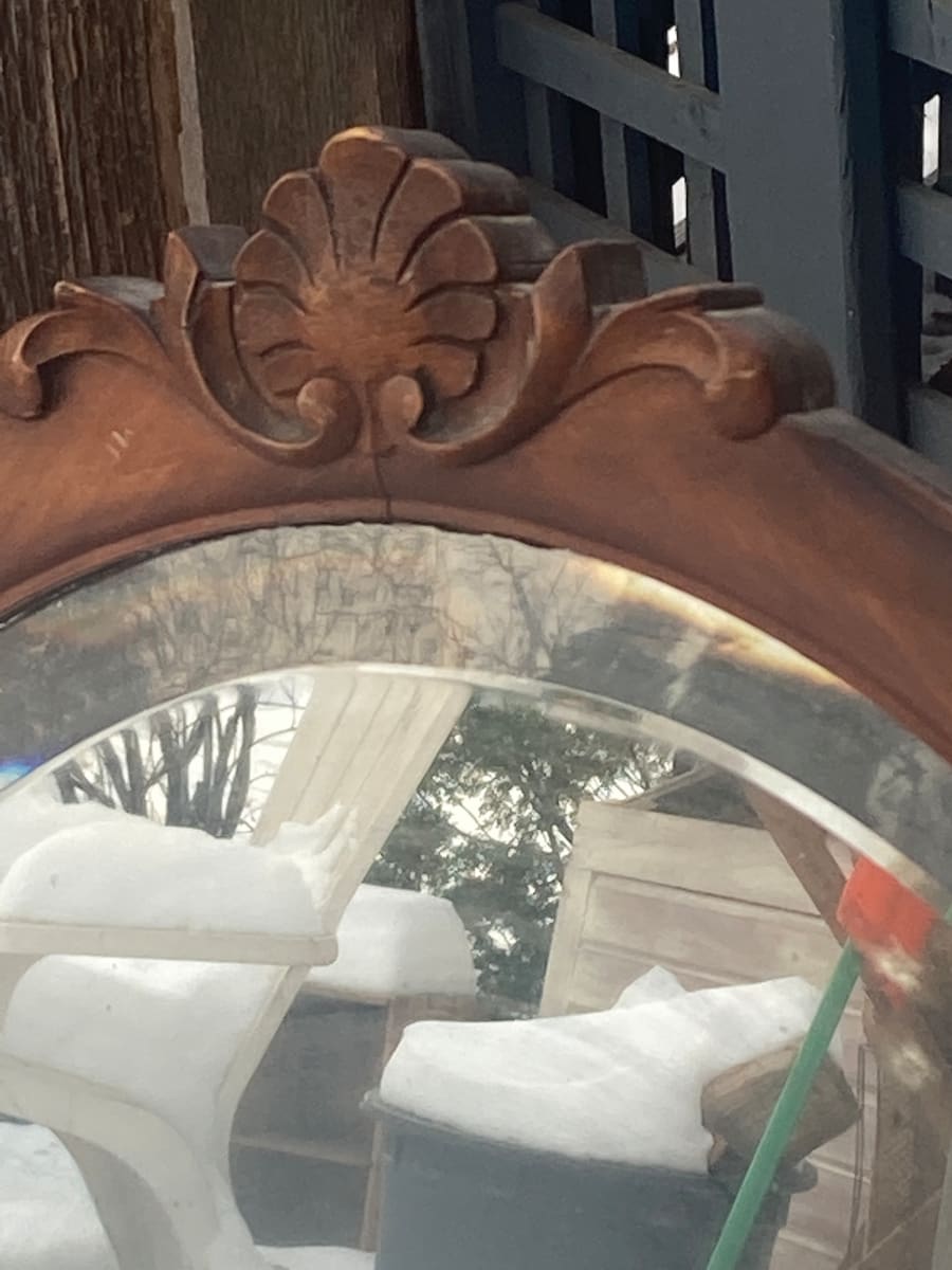 turn of the century oval mirror 