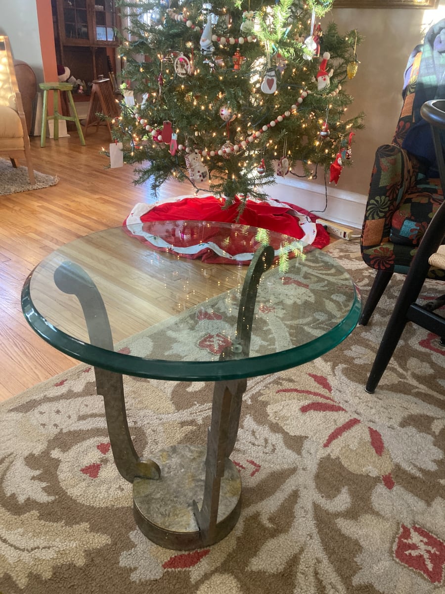 Modern glass top metal base accent table 