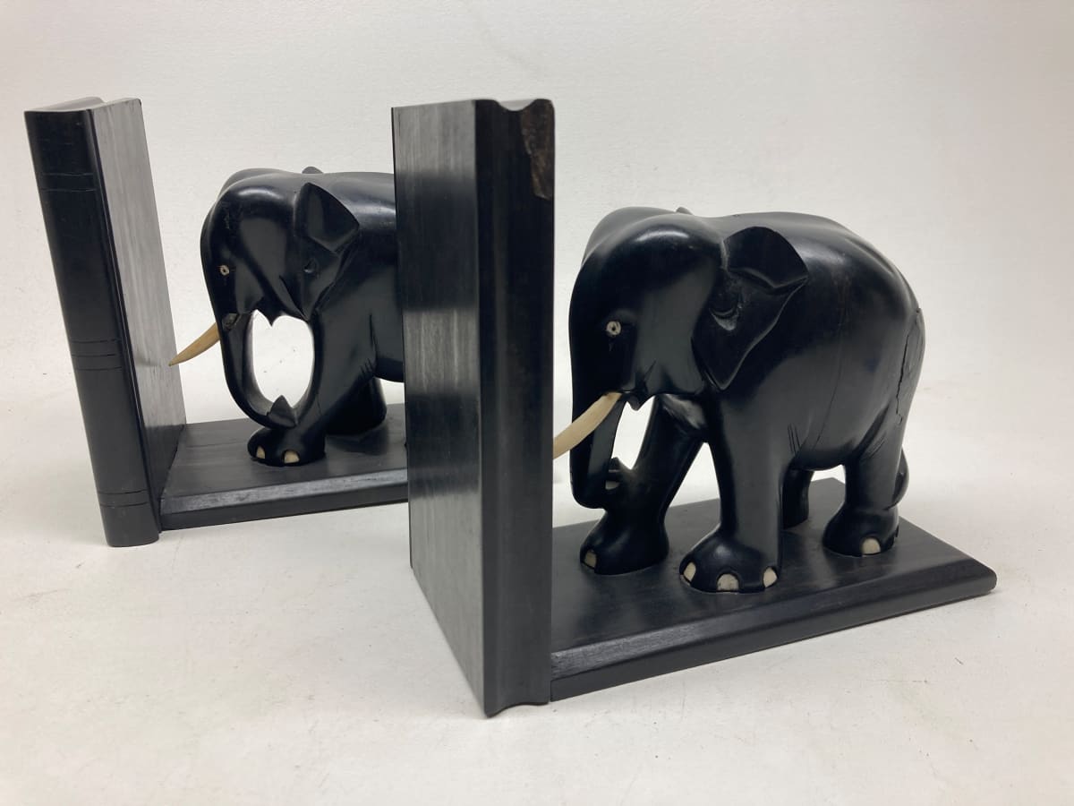 pair of ebony carved elephant bookends 