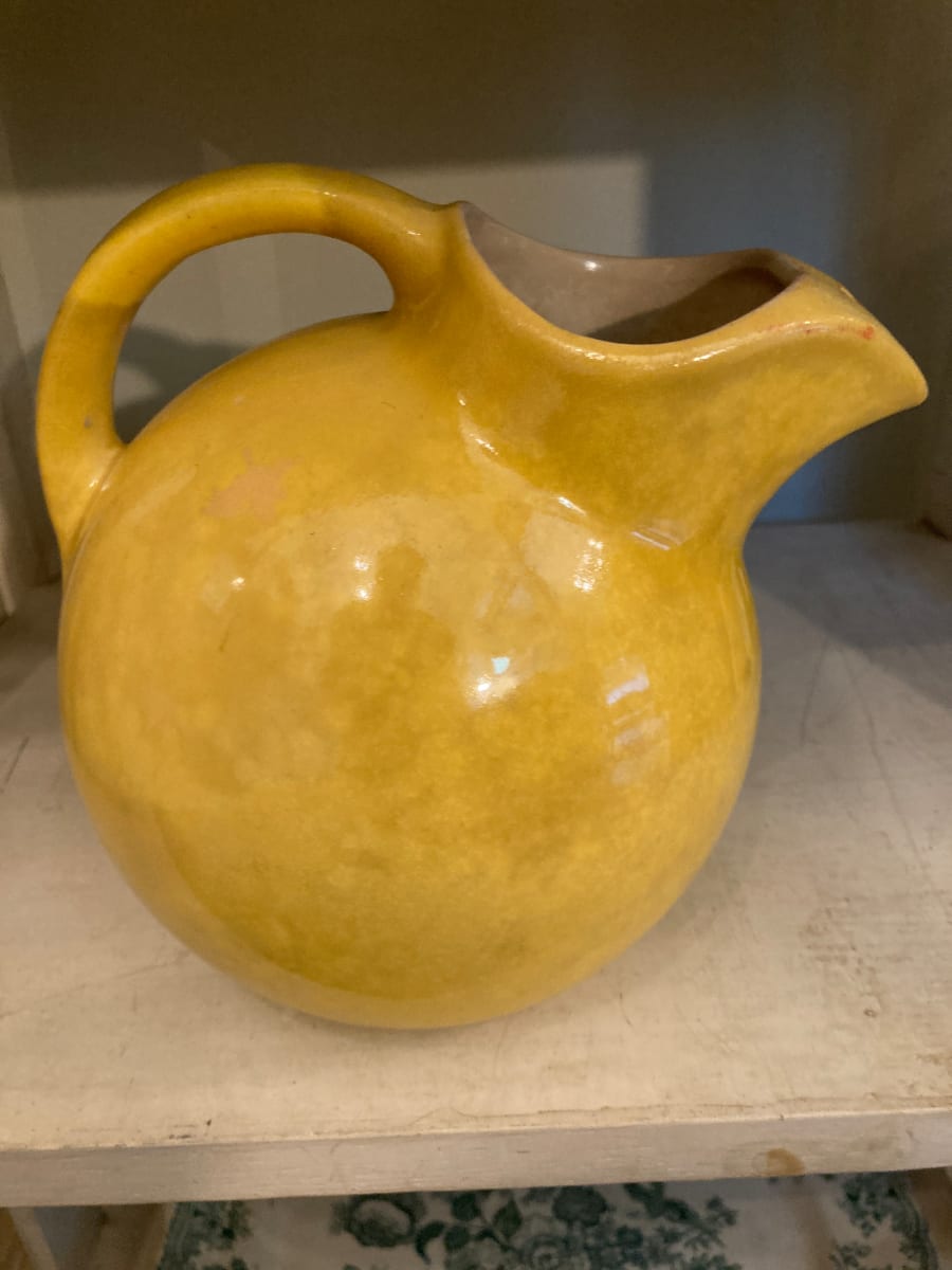 yellow ball pottery pitcher 