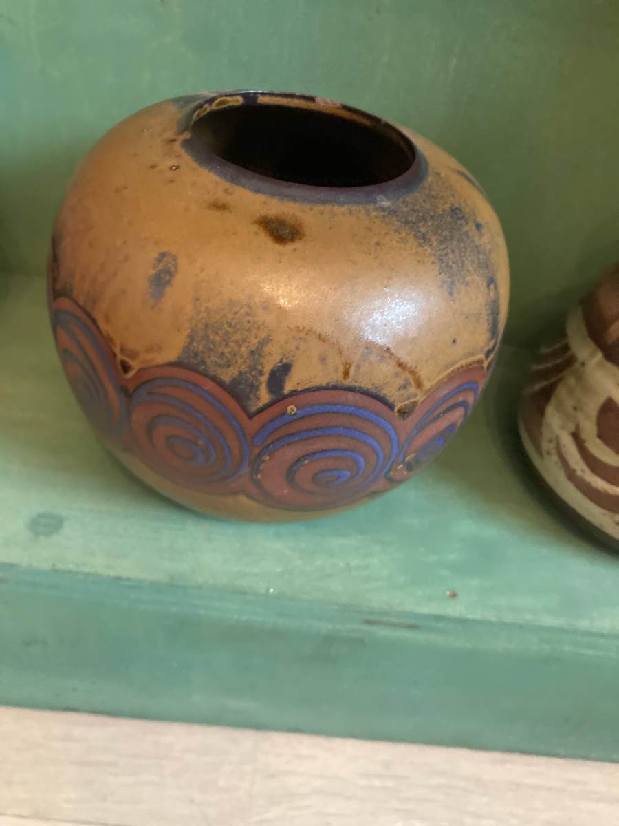 Scandinavian pottery vase with purple swirls 