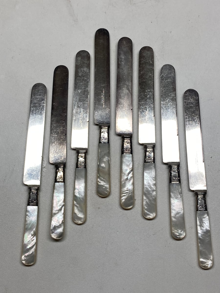 Set of 8 pearl handled turn of the century knives 
