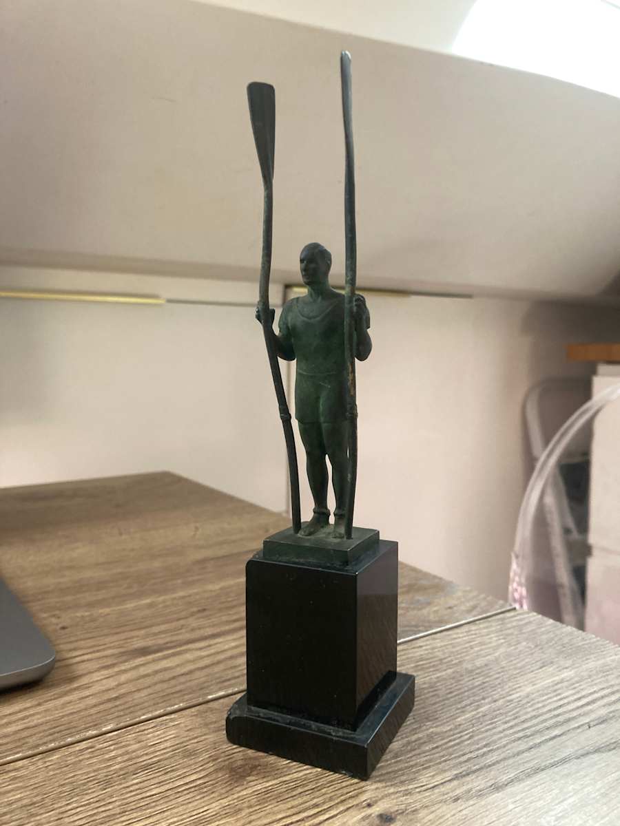 Rowing bronze sculpture on marble base 