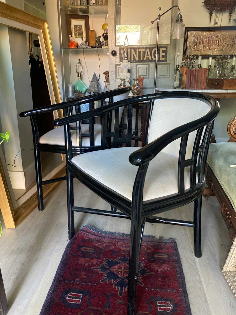 pair of black lacquered Italian club chairs 