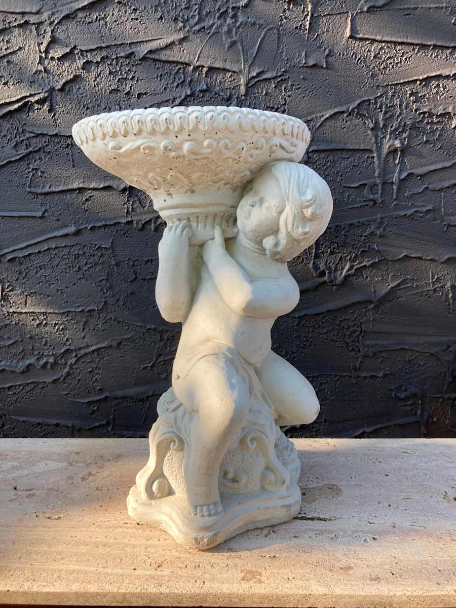 Garden cement cherub with vase on shoulder 