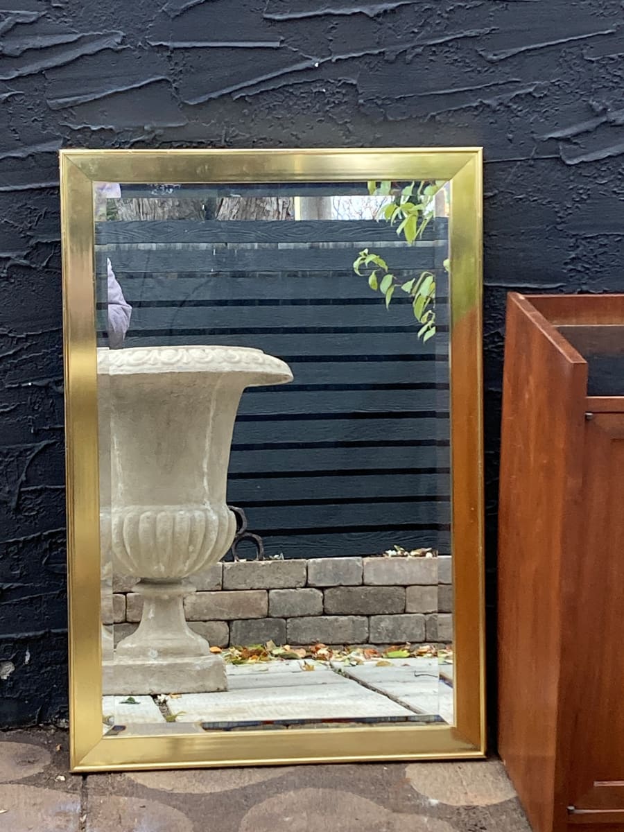 Beveled brass mirror 