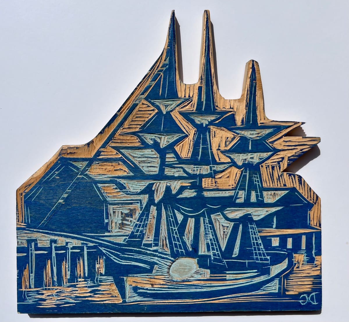 Demonstration Print, Berwick Academy 2014, Woodblock by Don Gorvett  Image: A puzzle piece shaped woodblock with the original pigment from a school printing demonstration in 2014.